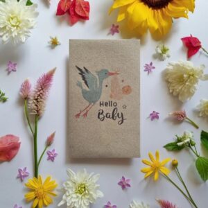 Stork Holding Baby, Hello Baby in writing, filled with bee friendly flower seeds
